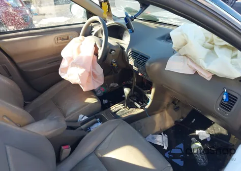 1999 Acura Integra Gs z USA, uszkodzony, nr VIN JH4DB7667XS002132